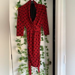 This beautiful red Liz Claiborne dress is ready for you! It’s a small.